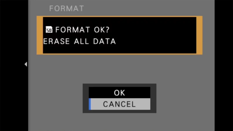 Fujifilm X100VI format confirmation screen with Cancel highlighted below the erase all data warning