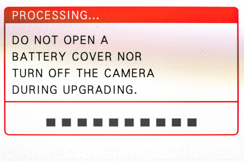 X100VI screen showing firmware processing progress bar during the upgrade