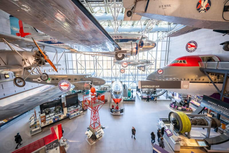 Vintage aircraft suspended from the ceiling in the National Air and Space Museum's America by Air gallery