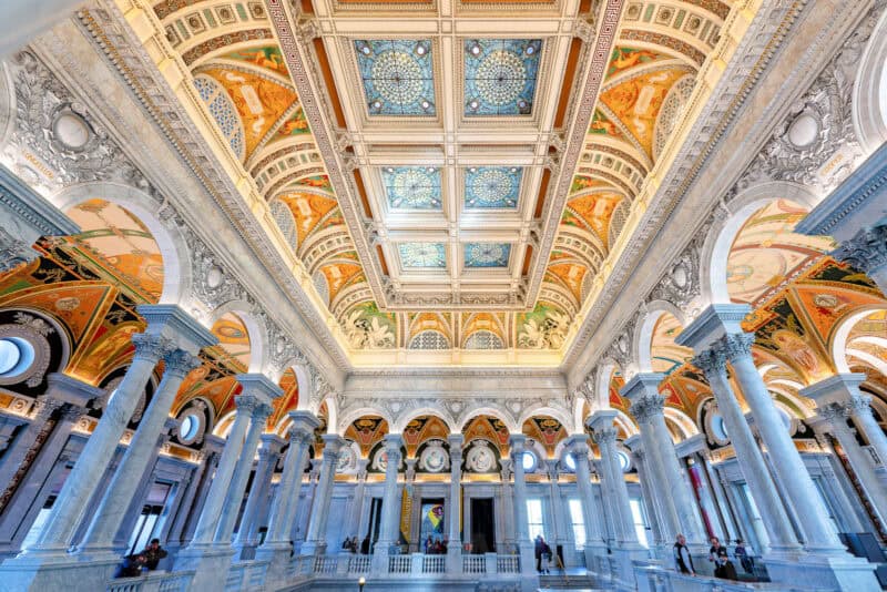 Library of Congress Great Hall ceiling with ornate stained-glass panels and marble columns