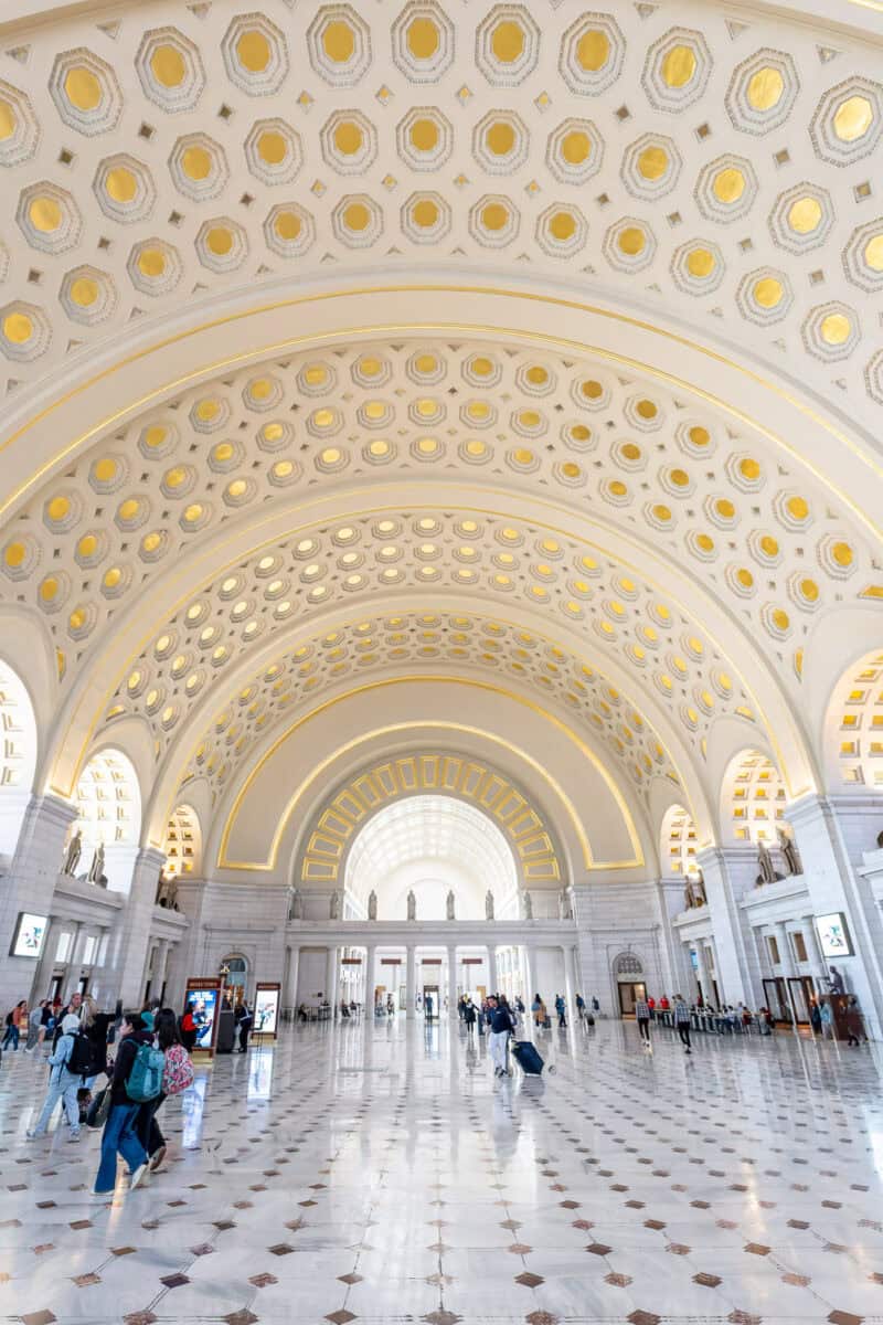 Gold-coffered barrel-vaulted ceiling above the marble main hall of Union Station