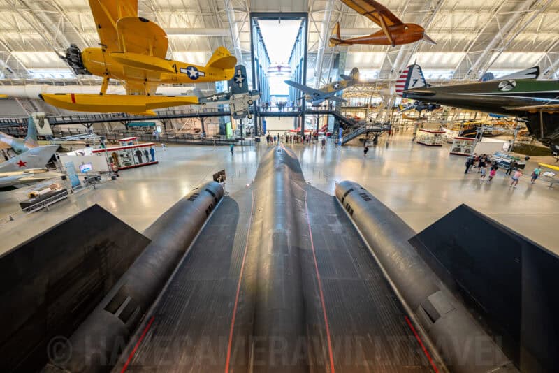 Wide view down the fuselage of a Lockheed SR-71 Blackbird spy plane inside a museum hangar