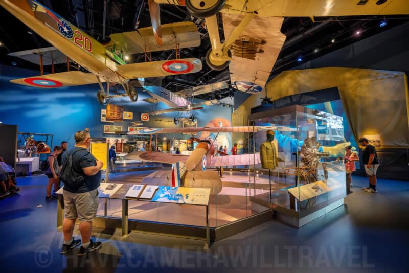 Vintage biplanes and aviator displays in a National Air and Space Museum gallery