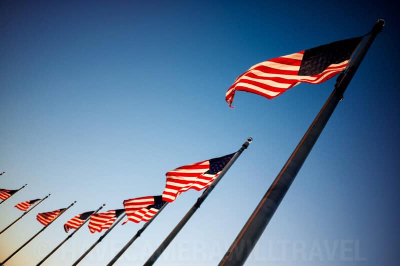 American Flags Waving In The Wind Washington DC. Photo by David Coleman - havecamerawilltravel.com