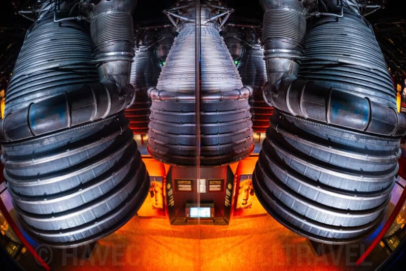 Symmetrical close-up of the Saturn V rocket engines displayed at a space museum exhibit