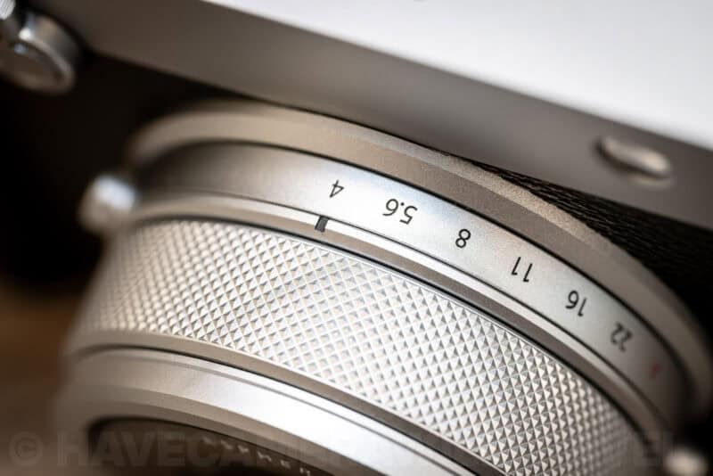 Close-up of the manual aperture ring on the Fujifilm GFX100RF lens showing f-stop markings