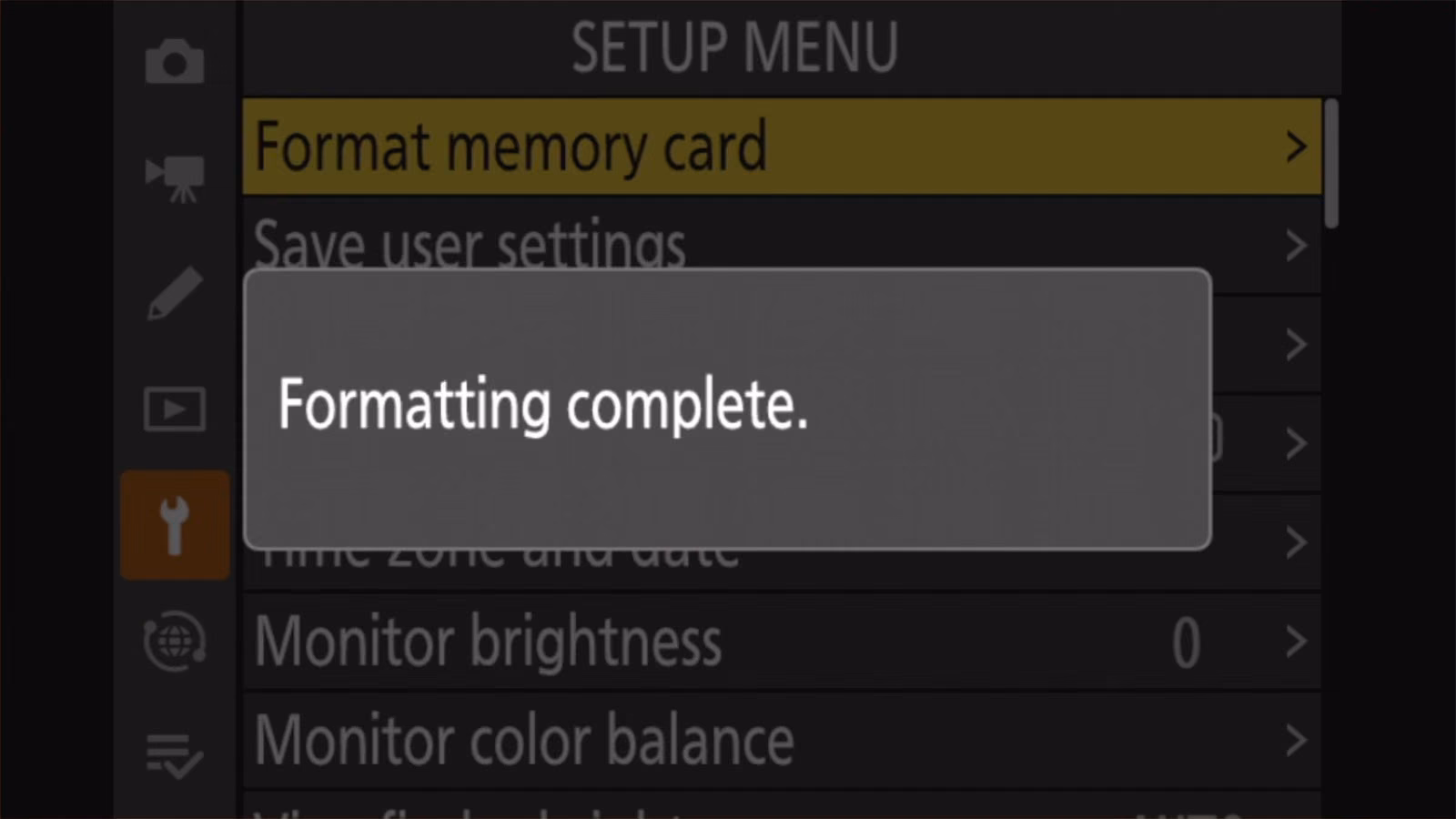 Nikon Z50 II screen showing the message Formatting complete.